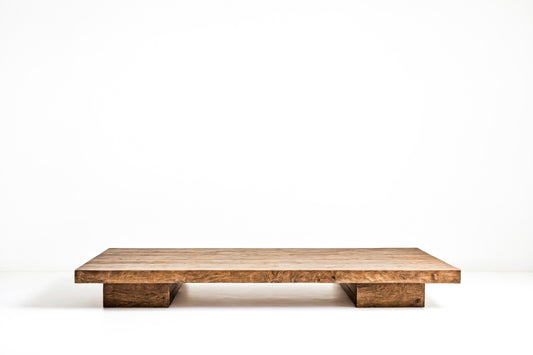 Low Wooden coffee table shelf on a white background